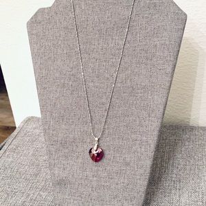 Crystal heart shape pendant with necklace.